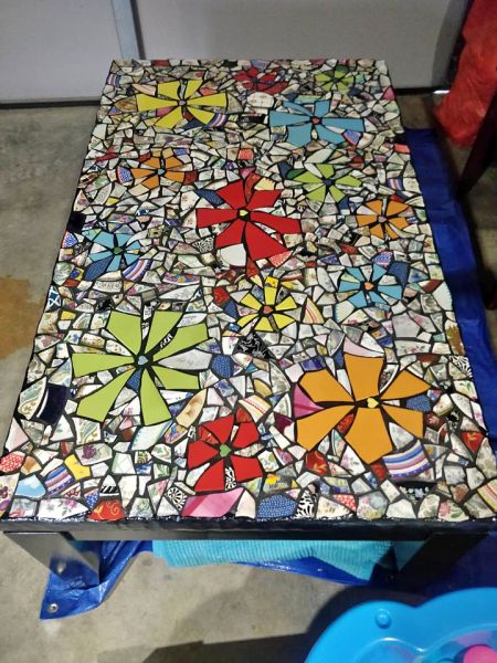 Tiled coffee table made from broken crockery made by a crazy wife