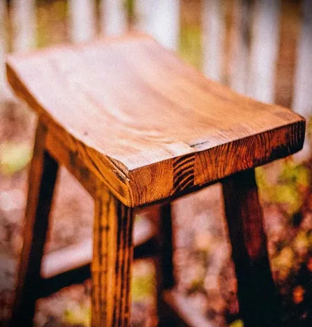 A beautiful, handmade wooden stool.