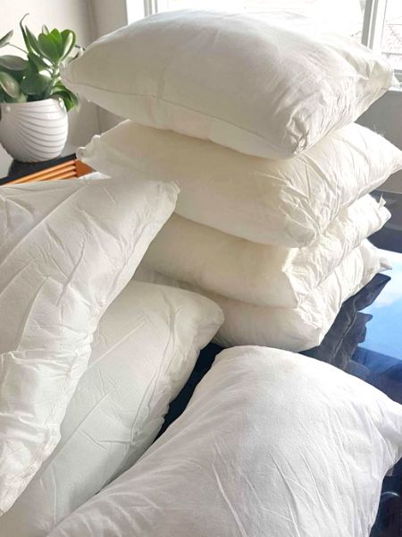 Are feather filled or polyester filled cushion pads better?